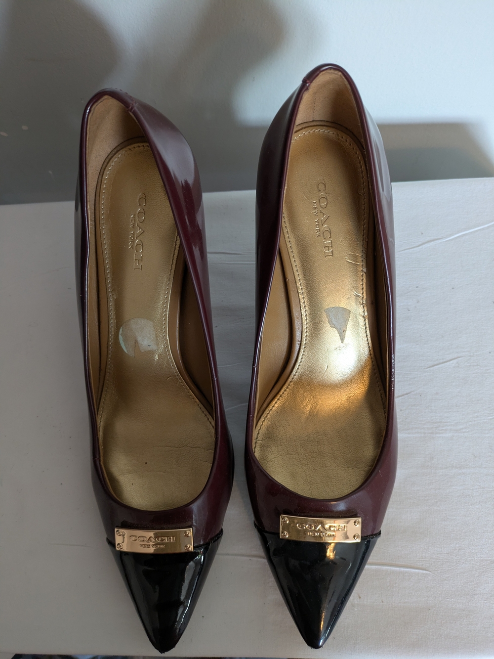 Coach Two-Tone Pointed Patent Pumps in Burgundy and Black
